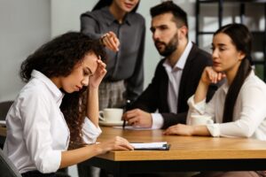 African American woman suffering from racial discrimination at w