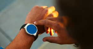 Black Male hand with Smart Watch on wrist