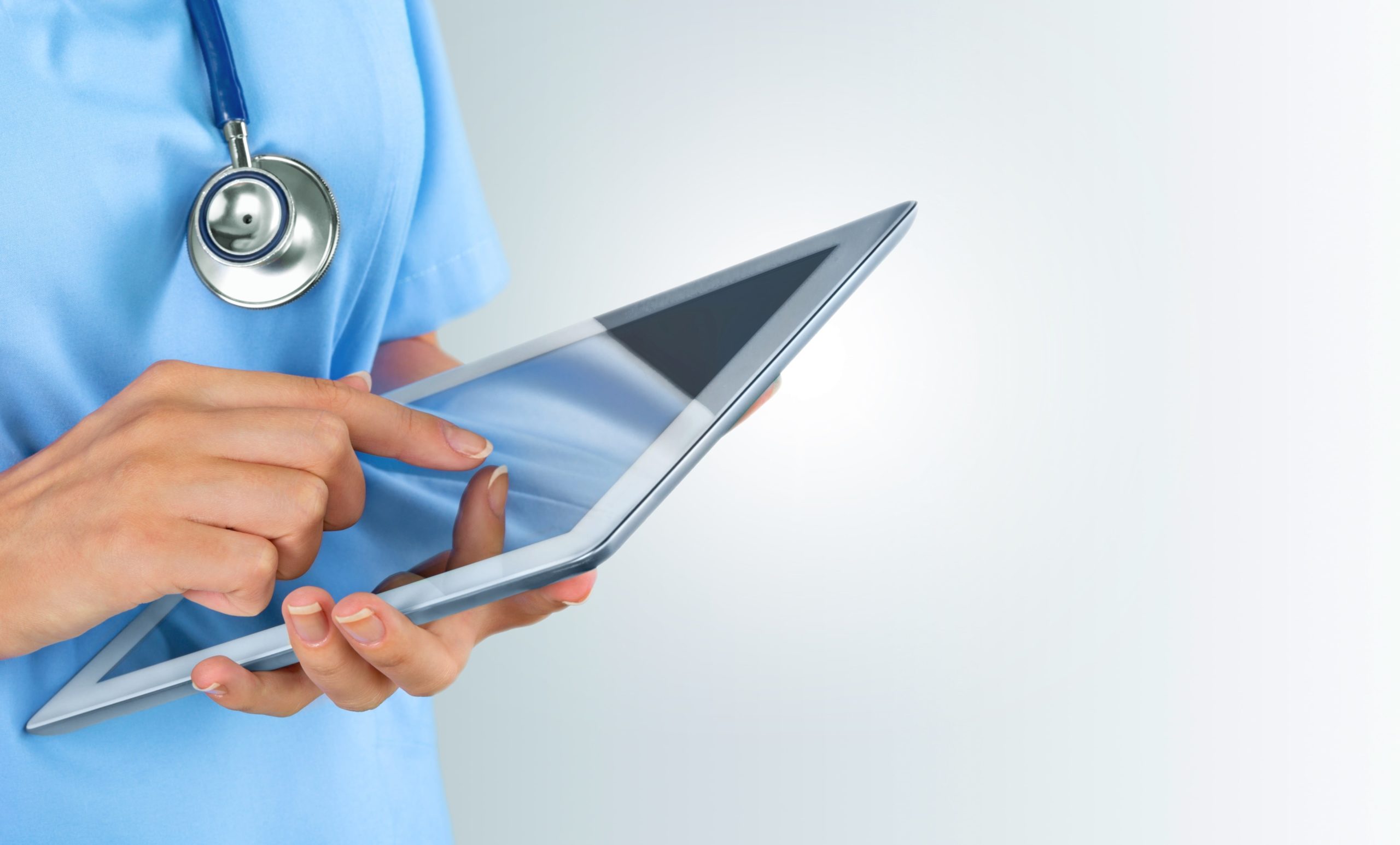 doctor holding ipad