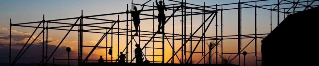 Construction team working on building