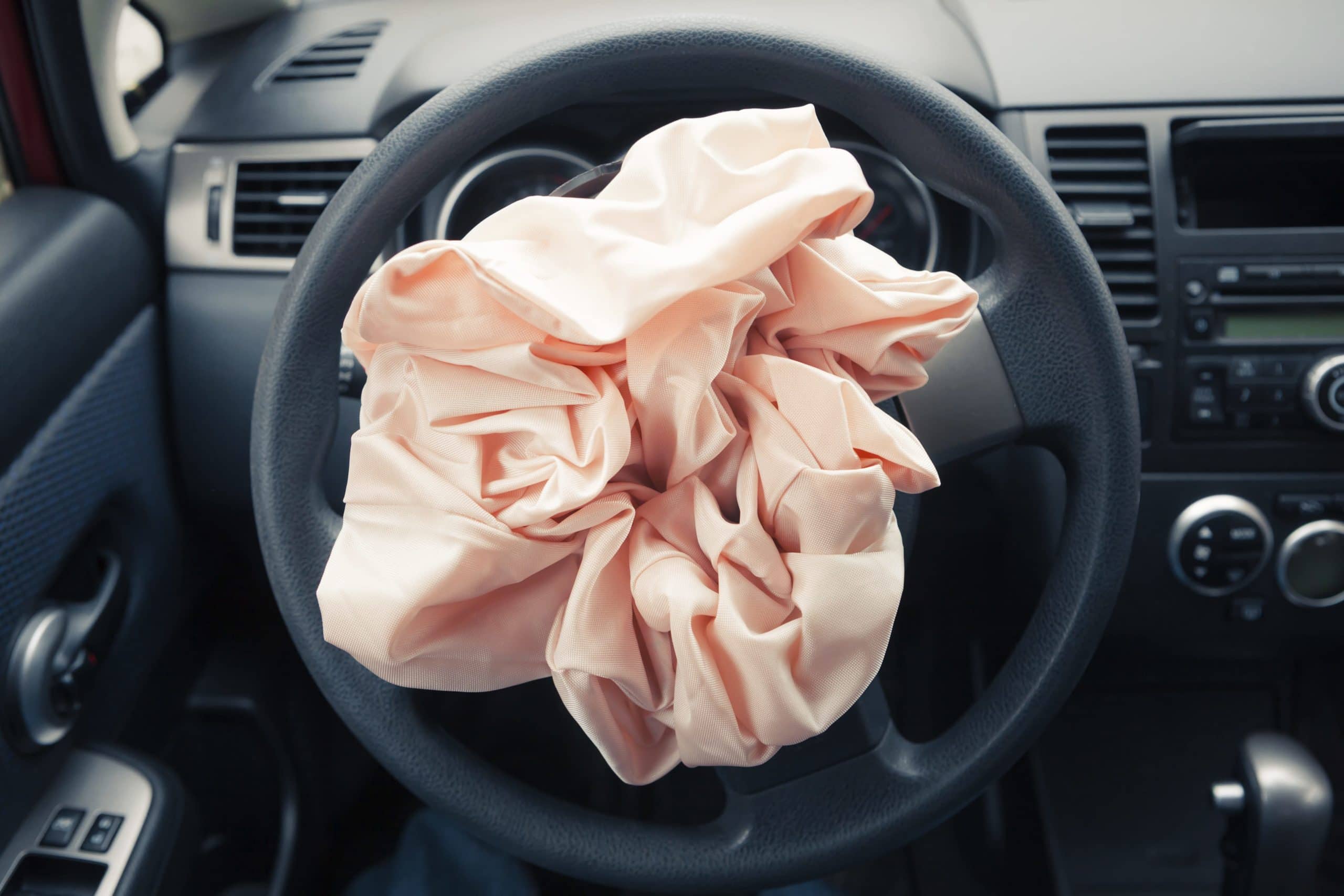 Deployed Airbag in Car