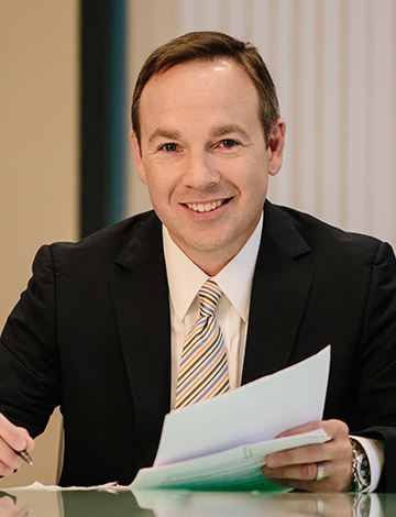 Portrait of Derek Y Brandt Partner of McCune Law Group