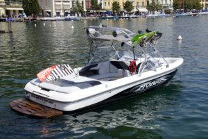 Wakeboarding Boat idling near dock