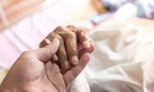 Holding Elderly person's hand