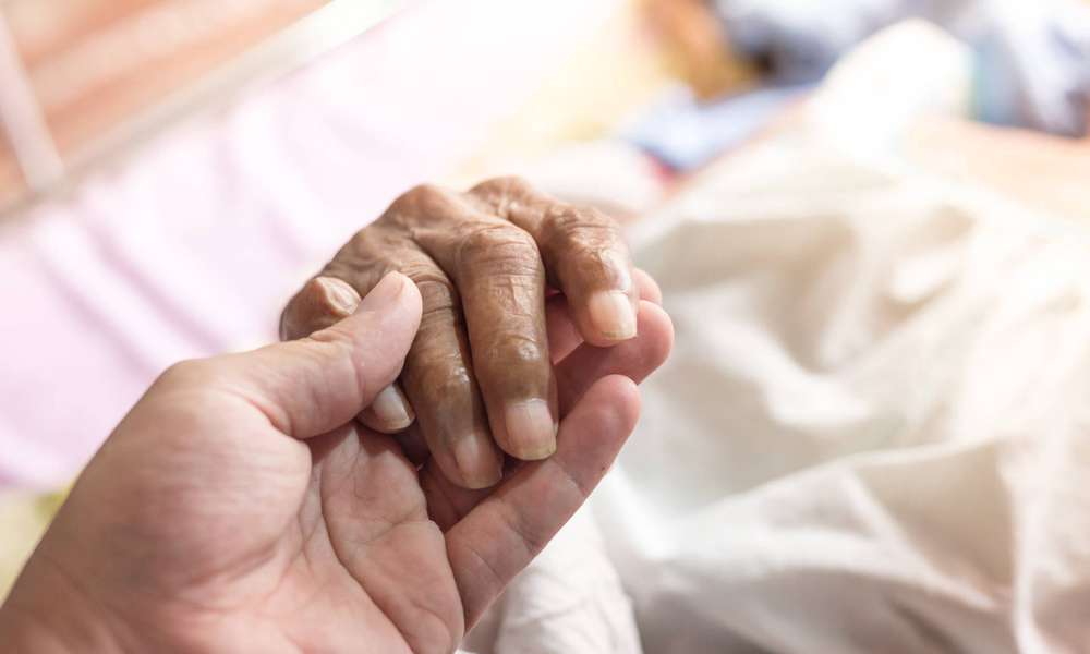 Holding Elderly person's hand
