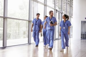 Doctors walking through hostpital