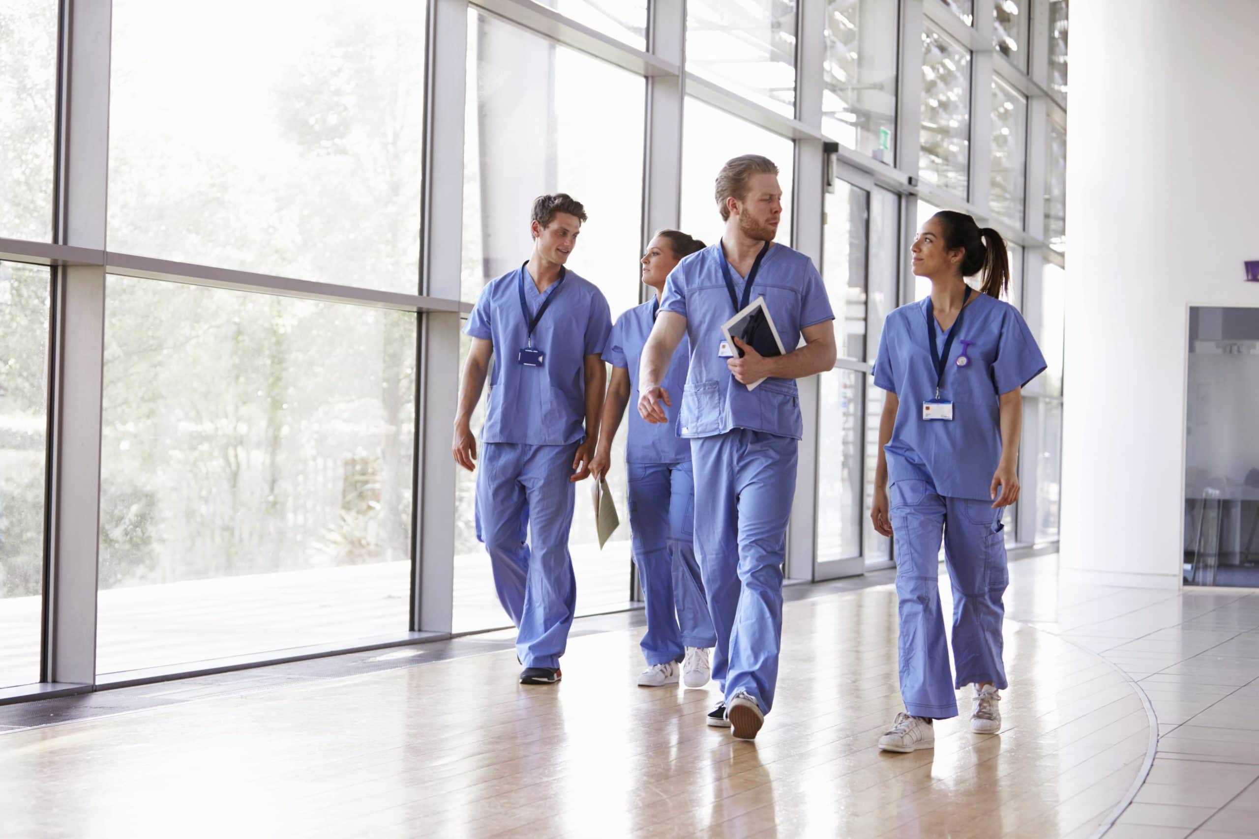 Doctors walking through hostpital