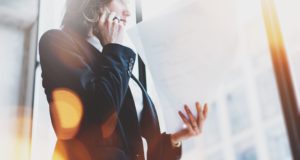Business-woman talking on phone